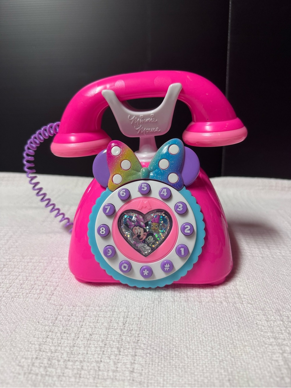 Disney Minnie Mouse Hot Pink Retro Toy Phone with Rainbow Bow.